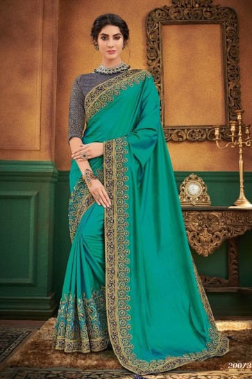 Net Fabric Embroidered Designer Teal Lovely Saree And Blouse