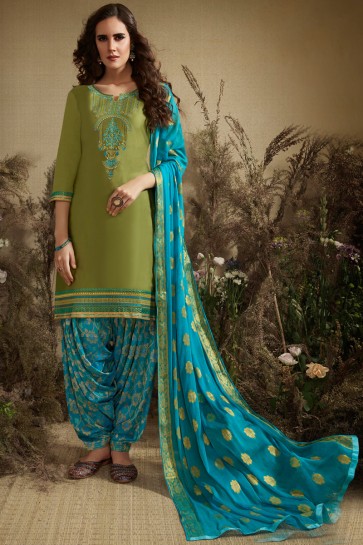 Diwali Special Jacquard And Embroidery Work Olive Cotton And Silk Patiala Suit