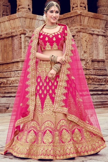 Charming Velvet Pink Embroidery And Stone Work Lehenga Choli With Net Dupatta