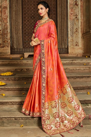Delicate Banarasi Silk Jacquard Fabric Orange Zari And Thread Work Saree And Blouse