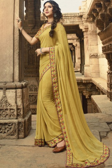 Ultimate Mustard Georgette Printed And Border Work Saree And Blouse