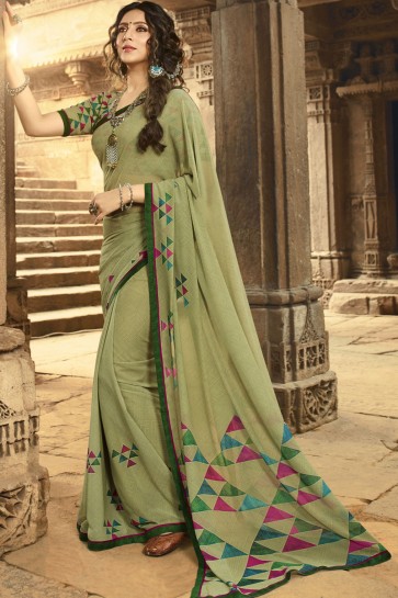 Heavy Designer Pista Printed And Border Work Georgette Saree And Blouse