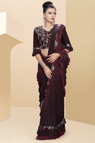 Delightful Maroon Lycra Fabric Thread Work And Sequins Work Flare Saree With Velvet Blouse