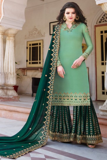 Party Wear Stone Work And Embroidered Light Green Satin Fabric Plazzo Suit With Georgette Dupatta